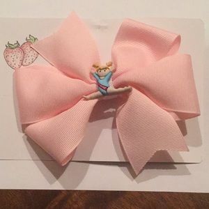 Pink gymnastics bow.